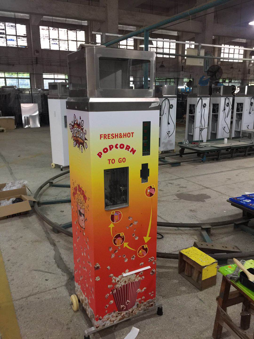 Máquina de venda automática de pipoca operada por moeda